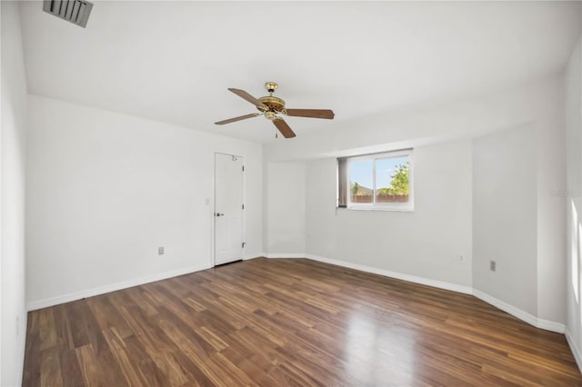 unfurnished room featuring ceiling fan and dark hardwood / wood-style flooring