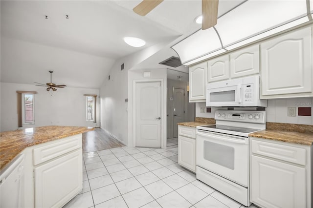 4204 Cockrell St, Port Charlotte, FL 33948 - kitchen with a ceiling fan, white appliances, light tile patterned floors, lofted ceiling, and visible vents