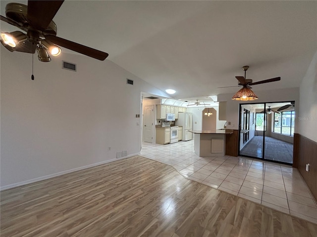 4204 Cockrell St, Port Charlotte, FL 33948 - unfurnished living room featuring light wood-style flooring, visible vents, and a ceiling fan