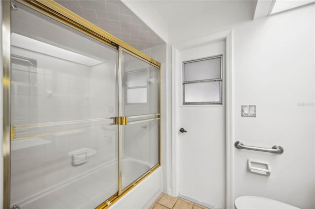 4204 Cockrell St, Port Charlotte, FL 33948 - full bathroom featuring tile patterned flooring, combined bath / shower with glass door, and toilet