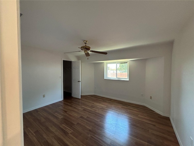 4204 Cockrell St, Port Charlotte, FL 33948 - empty room featuring baseboards, ceiling fan, and dark wood finished floors