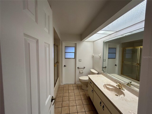4204 Cockrell St, Port Charlotte, FL 33948 - full bath with an enclosed shower, tile patterned flooring, vanity, and toilet