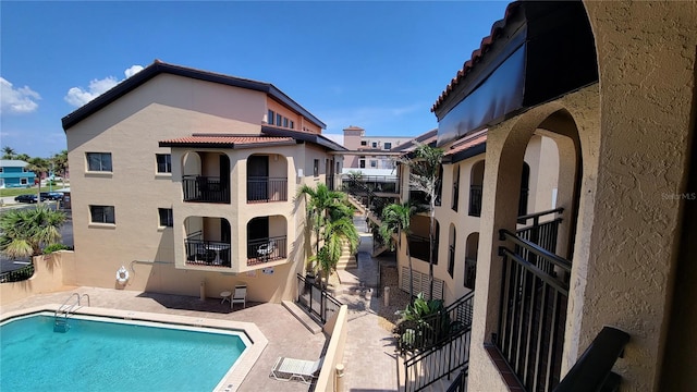 view of pool featuring a patio area