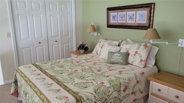 bedroom featuring carpet and a closet