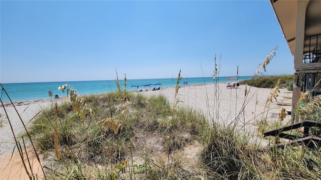 property view of water featuring a view of the beach