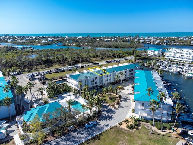 drone / aerial view with a water view