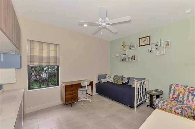 bedroom featuring ceiling fan and light tile patterned flooring