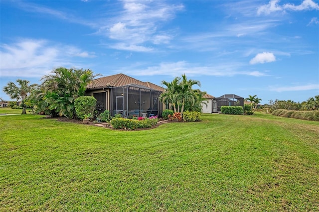 view of yard with a lanai