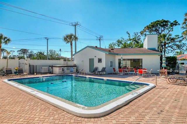 view of pool featuring a patio area