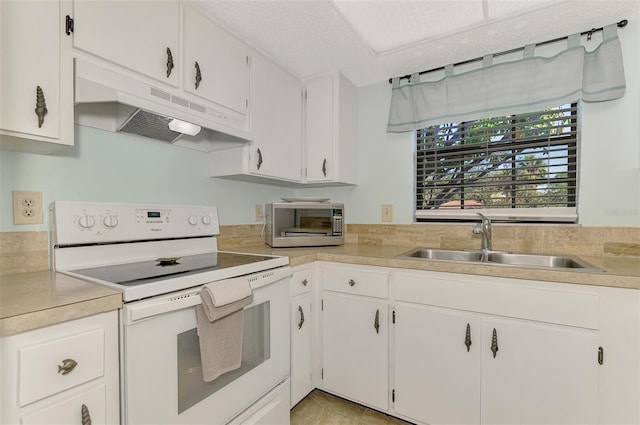 kitchen featuring sink, a textured ceiling, white cabinets, and white electric range oven