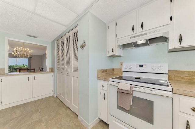 kitchen with decorative light fixtures, white cabinetry, a chandelier, electric range, and a textured ceiling