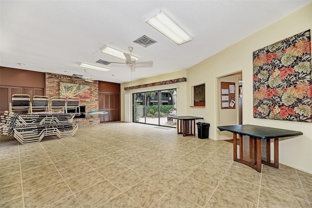 interior space featuring ceiling fan