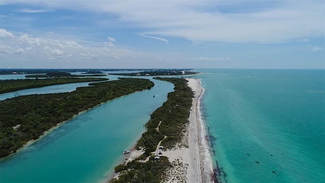 bird's eye view with a water view and a view of the beach