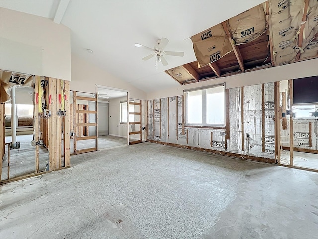 interior space with vaulted ceiling and ceiling fan