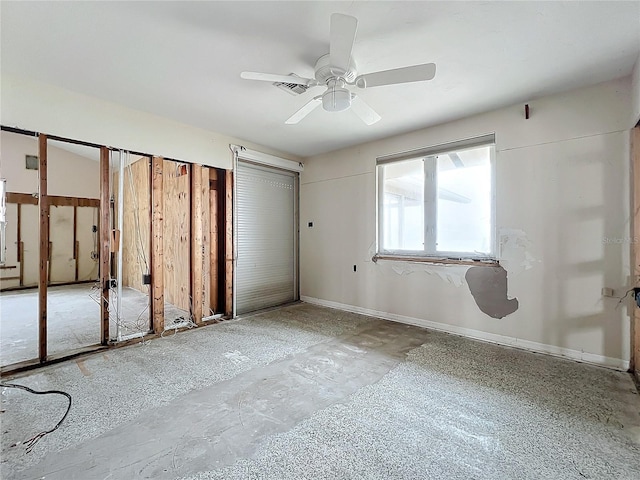 unfurnished bedroom featuring ceiling fan