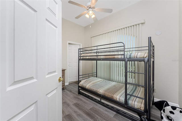 bedroom with ceiling fan and hardwood / wood-style floors