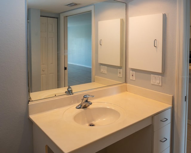 bathroom featuring vanity