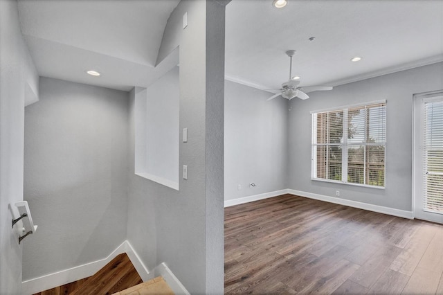 empty room featuring hardwood / wood-style flooring and ceiling fan