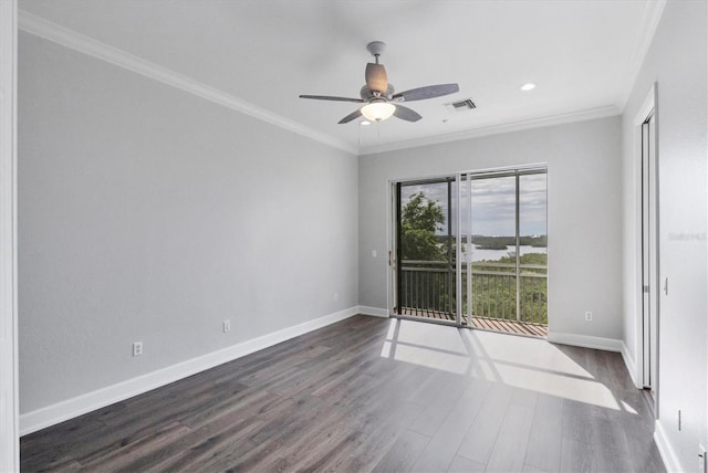 unfurnished room with crown molding, ceiling fan, and dark hardwood / wood-style floors