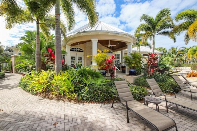 view of patio / terrace with french doors and ceiling fan