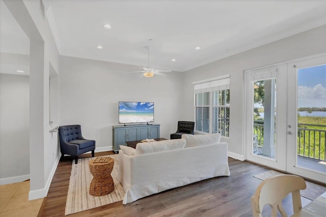 10360 Longshore Rd Unit 66, Placida, FL 33946 - living room with plenty of natural light, wood finished floors, ceiling fan, and recessed lighting
