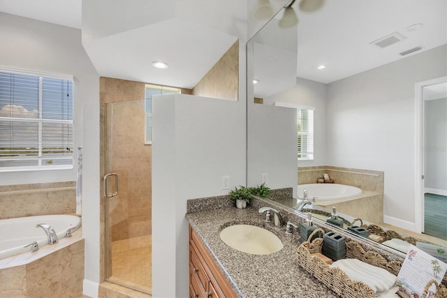 10360 Longshore Rd Unit 66, Placida, FL 33946 - full bath with vanity, a bath, and a stall shower