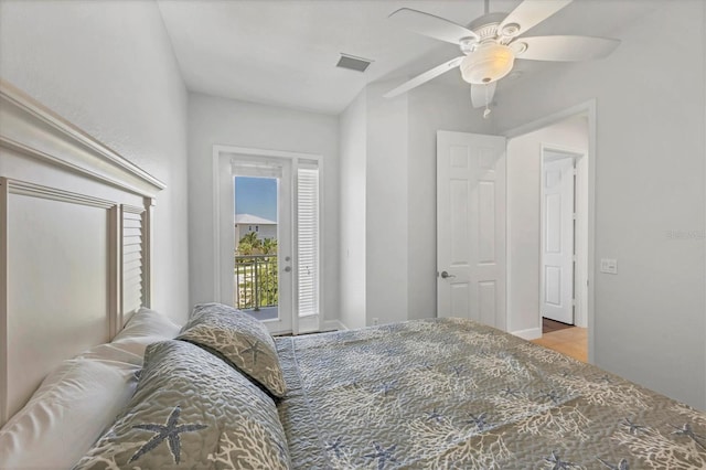 10360 Longshore Rd Unit 66, Placida, FL 33946 - bedroom featuring access to exterior and a ceiling fan