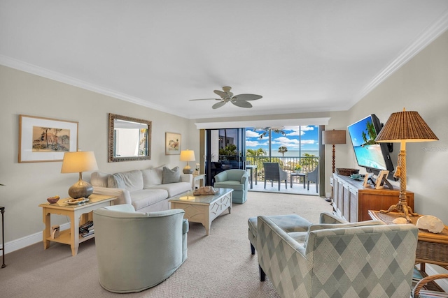 living room featuring ceiling fan, light colored carpet, and crown molding