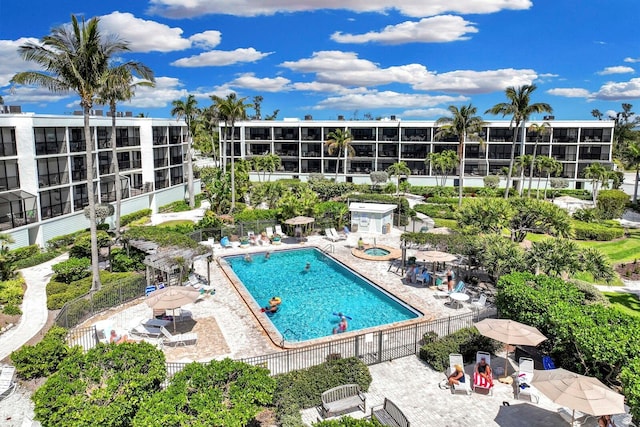 view of swimming pool with a patio