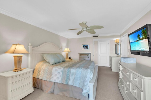 bedroom with ceiling fan, crown molding, and light carpet