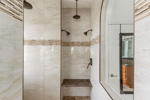 bathroom with tiled shower