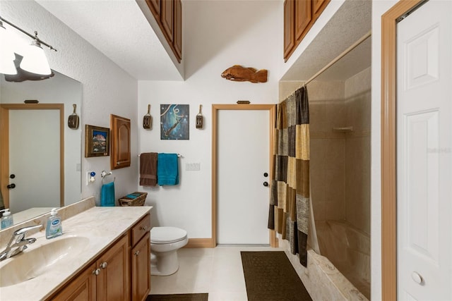 bathroom with toilet, walk in shower, and vanity