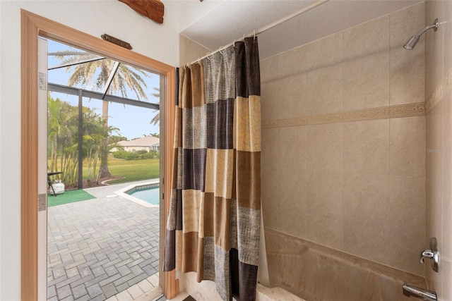 bathroom with shower / bath combination with curtain