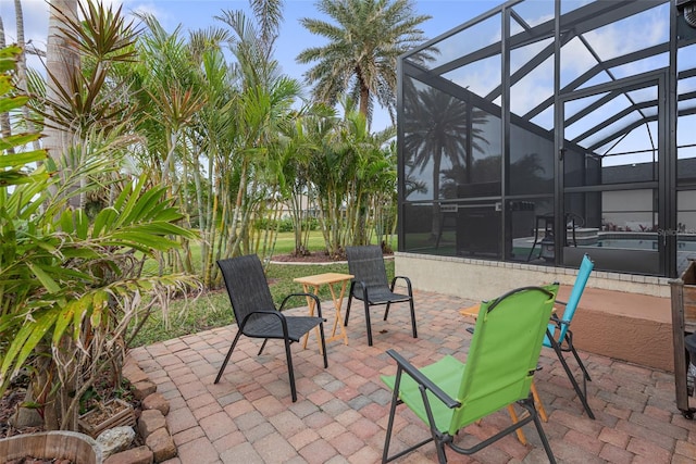 view of patio / terrace with glass enclosure