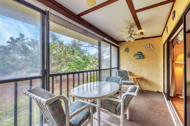 sunroom featuring plenty of natural light and ceiling fan