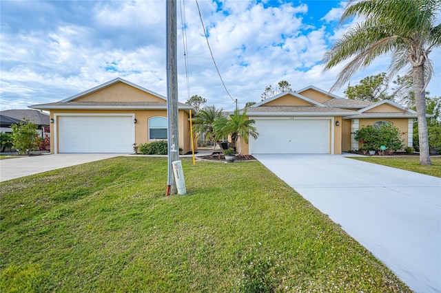 single story home featuring a front lawn and a garage