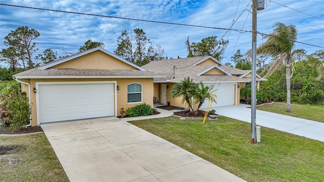 ranch-style home with a front yard and a garage