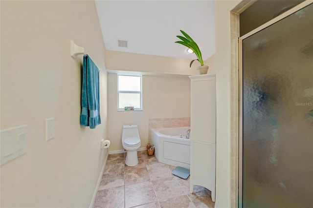 bathroom featuring tile patterned floors, toilet, and plus walk in shower