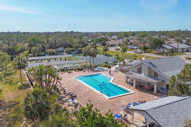 view of swimming pool featuring a patio area