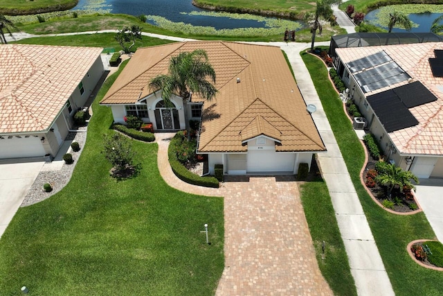 drone / aerial view with a water view