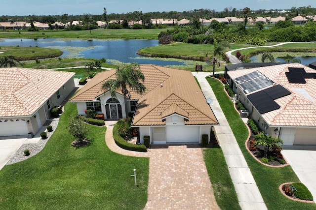 bird's eye view with a water view