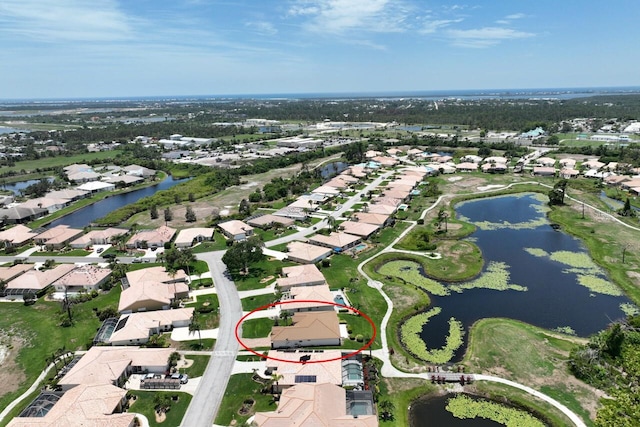 drone / aerial view with a water view