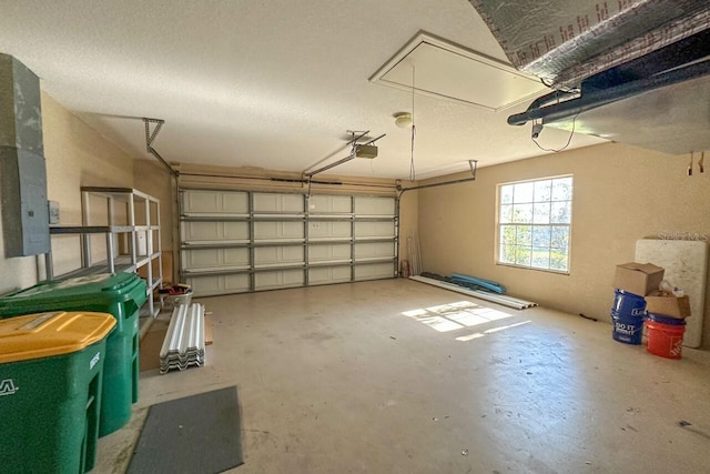 garage featuring a garage door opener