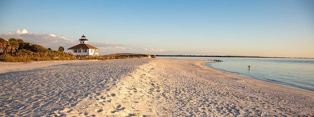 view of water feature with a beach view