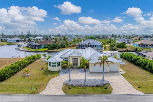 drone / aerial view with a water view