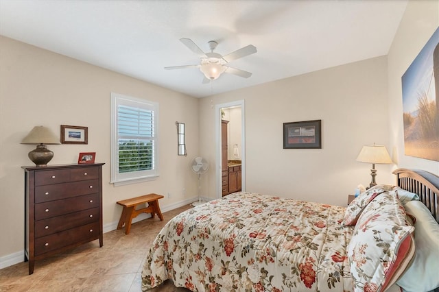 bedroom with connected bathroom and ceiling fan