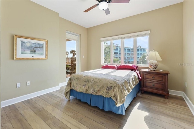 bedroom featuring ceiling fan and light hardwood / wood-style floors