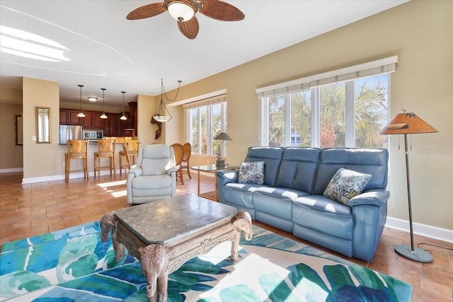 living room with ceiling fan