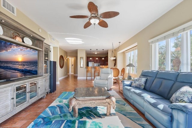 living room with ceiling fan