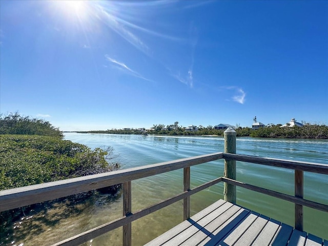 view of dock with a water view